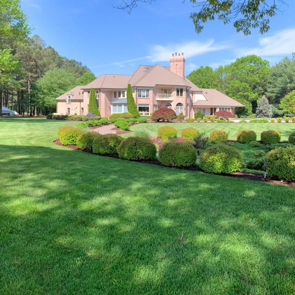 Corey Edsall performing professional turf management on an Eastern Shore Maryland property